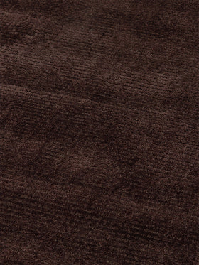 Close-up image of the Wolfram-Umber Textures rug.