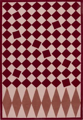 A rectangular area rug with a geometric harlequin pattern in deep burgundy and light beige, featuring diamond and square motifs.