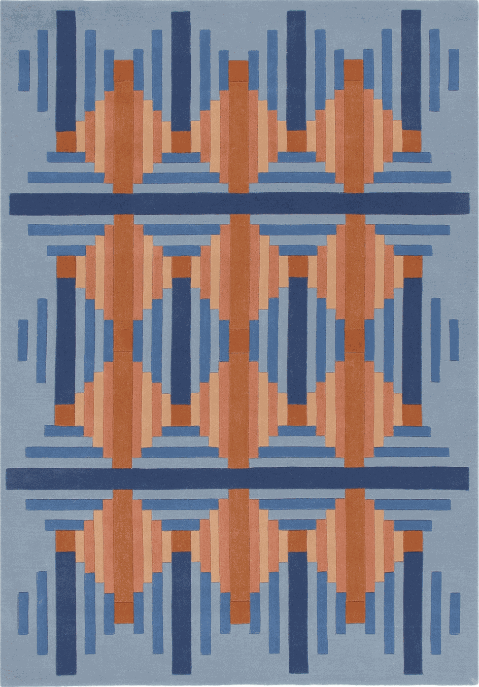 A square area rug with a geometric pattern featuring blue, navy, and terracotta orange shapes on a light blue-gray background.
