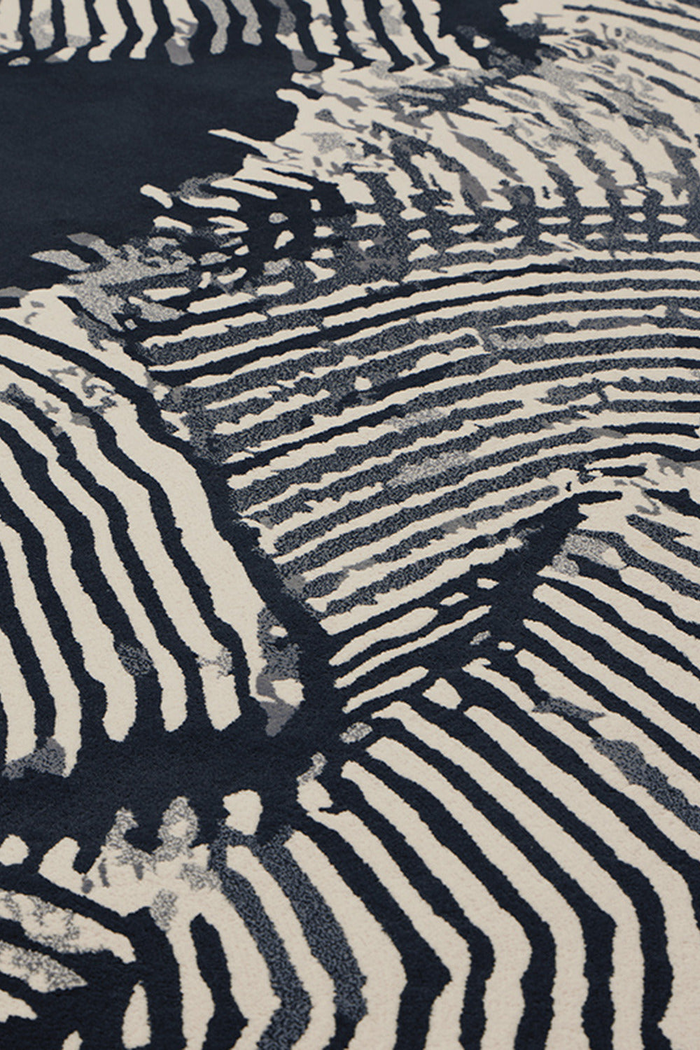 Close image of the Tassel Fern rug designed by Shibori