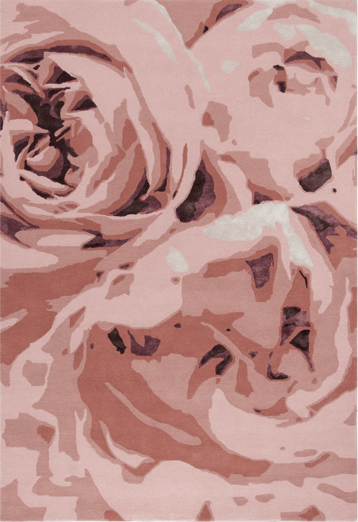 A square area rug featuring a stylized, graphic floral pattern of roses in shades of dusty pink, mauve, terracotta, and cream.
designed by Designer Rugs studio 