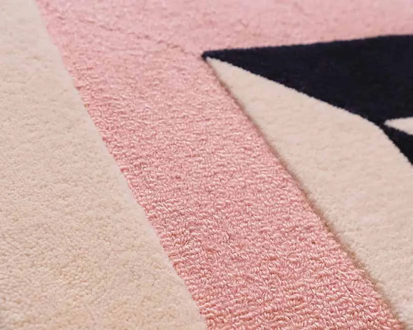 Loop pile surface in navy and blush