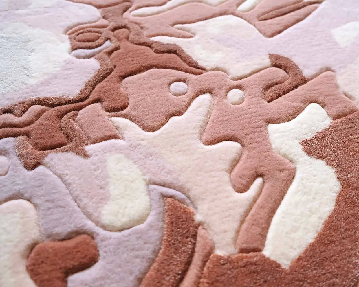 Carved semi-worsted wool pile in blush and stone