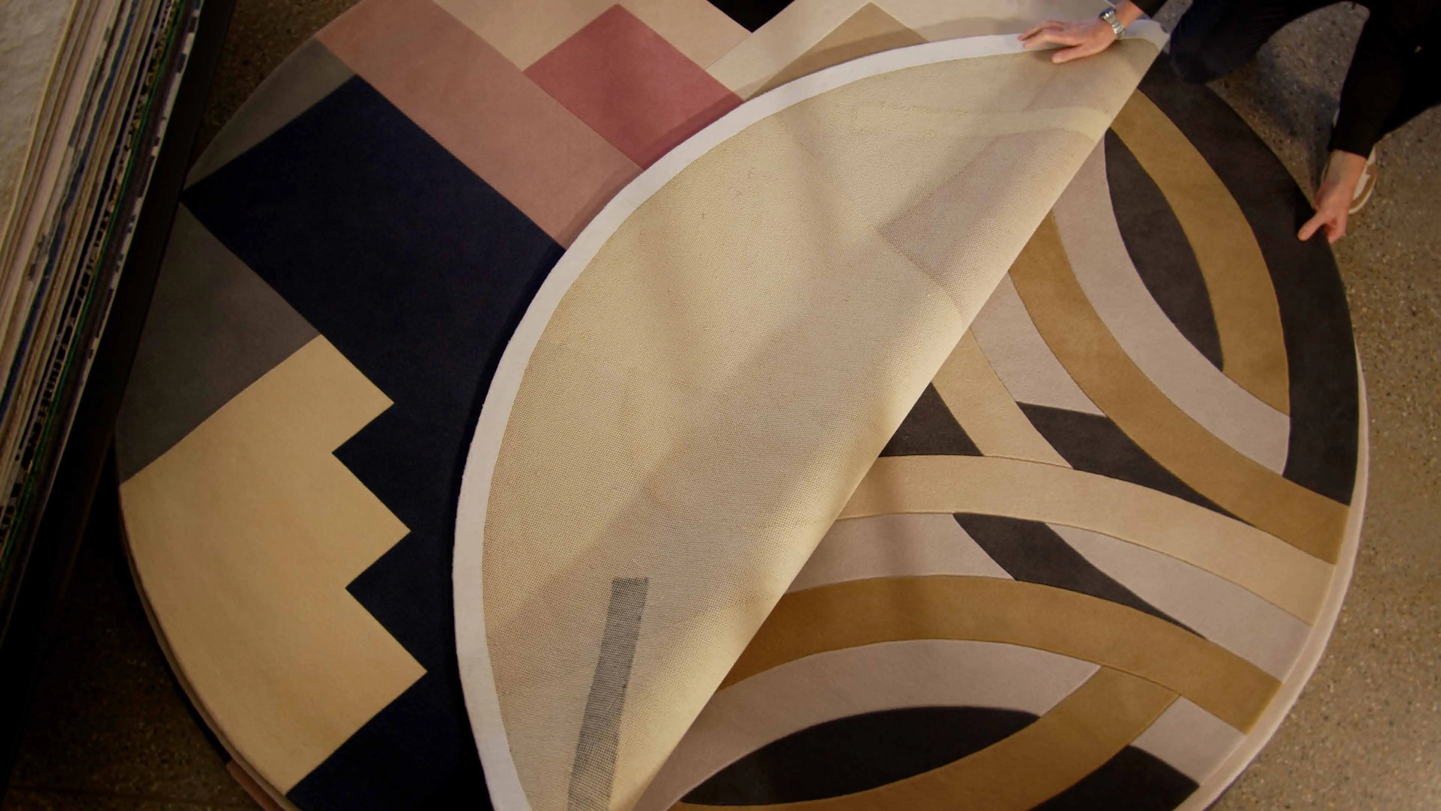 A custom rug in progress in the design studio