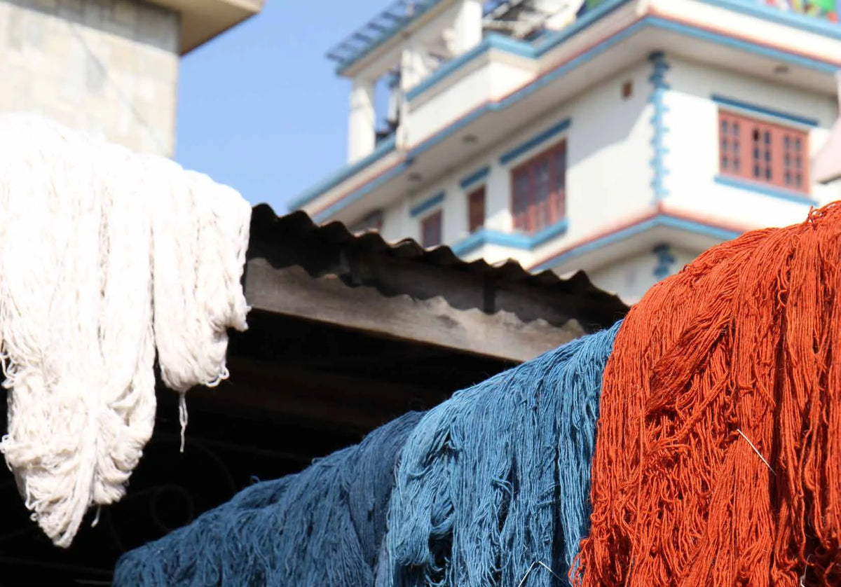 Dyed yarn drying at a partner facility
