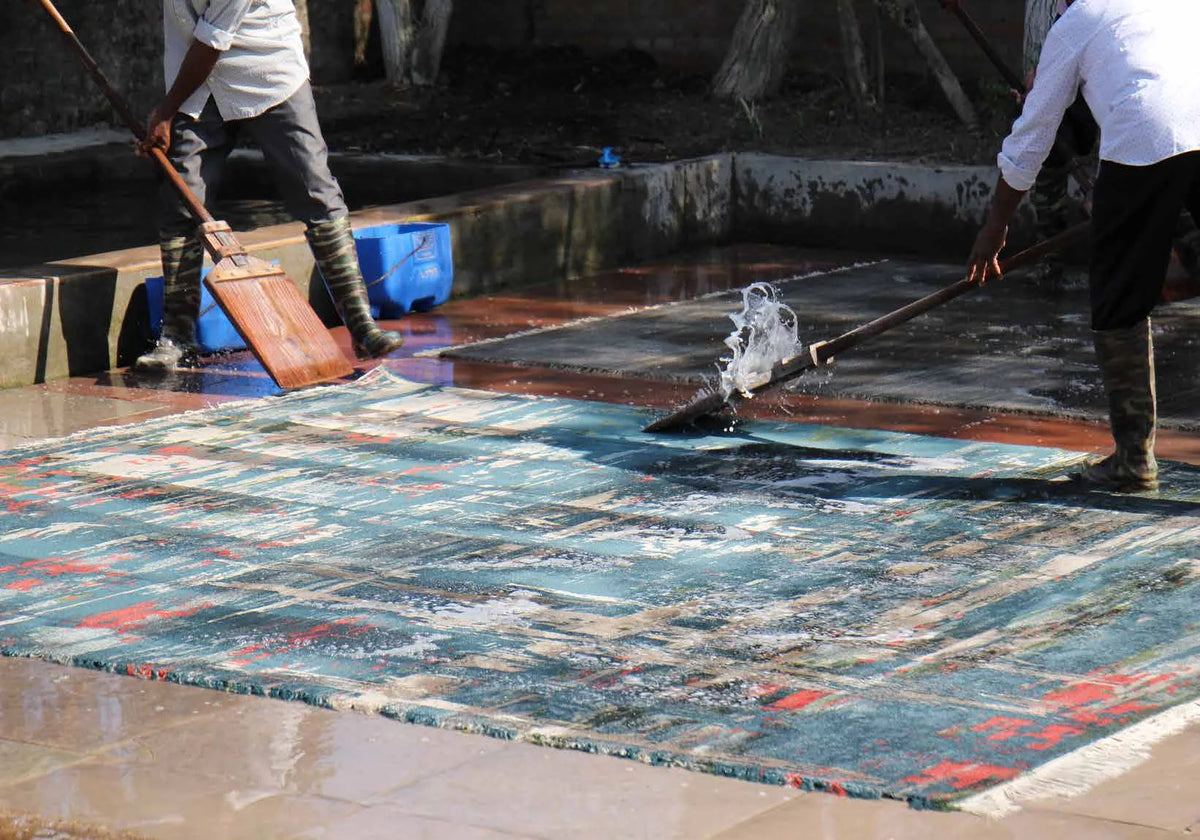 Finished rugs being washed